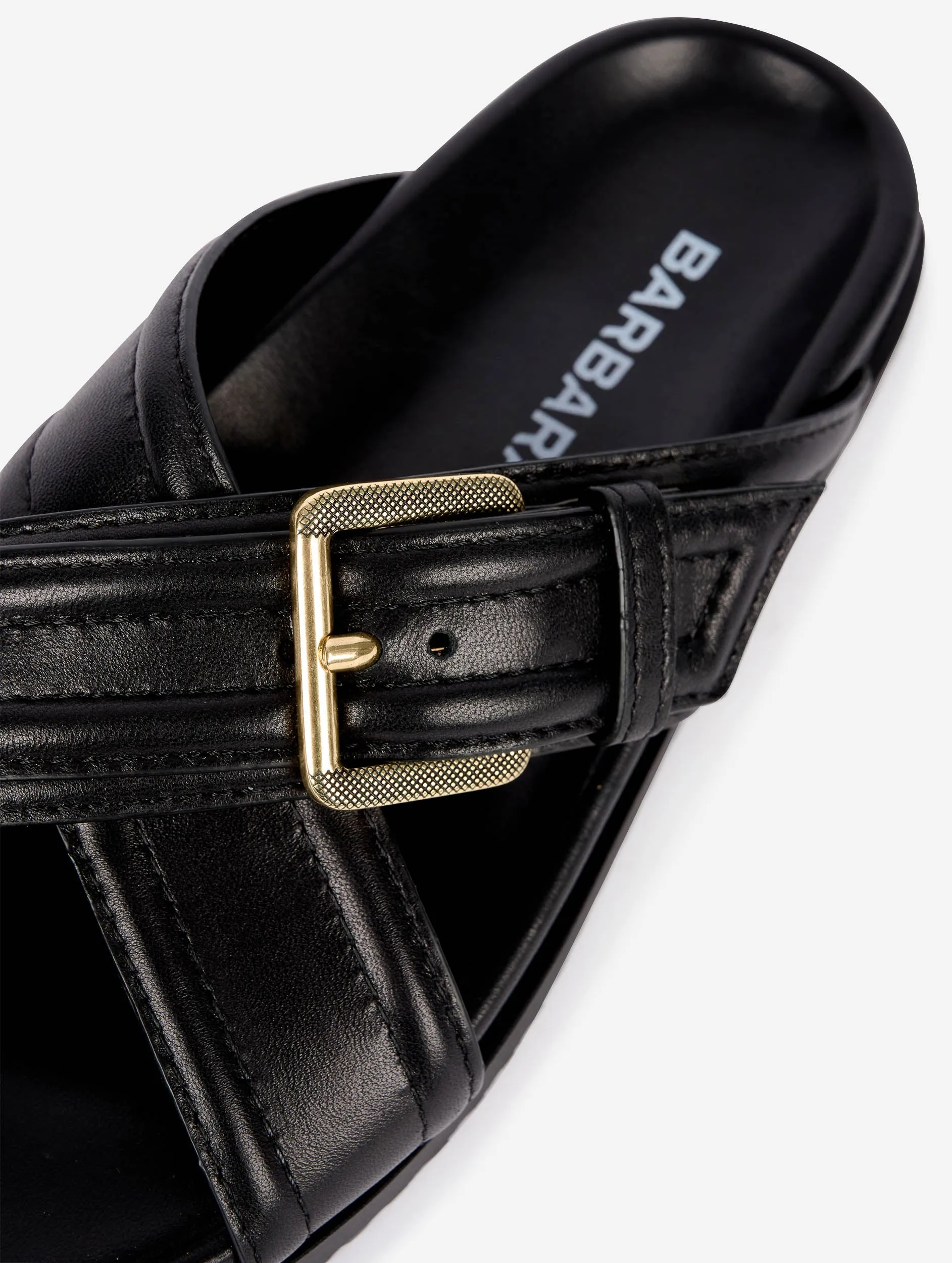 Anatomic mules in black leather
