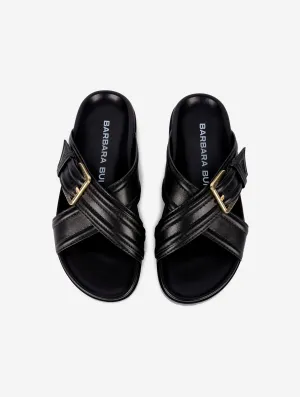 Anatomic mules in black leather