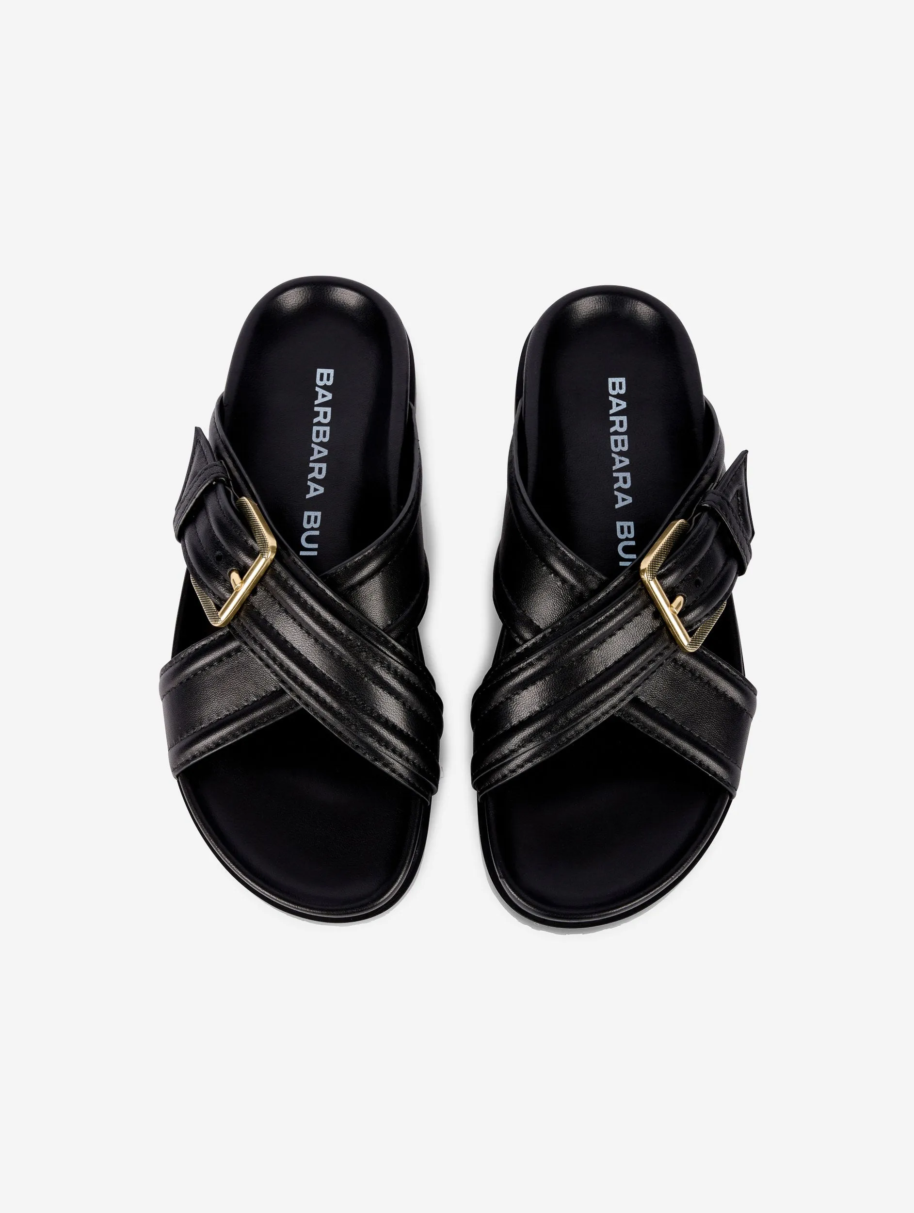 Anatomic mules in black leather