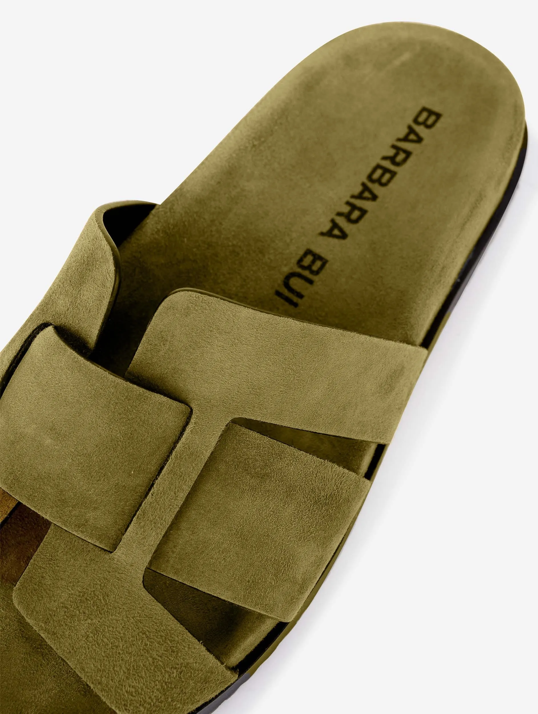Anatomic mules in linden green suede