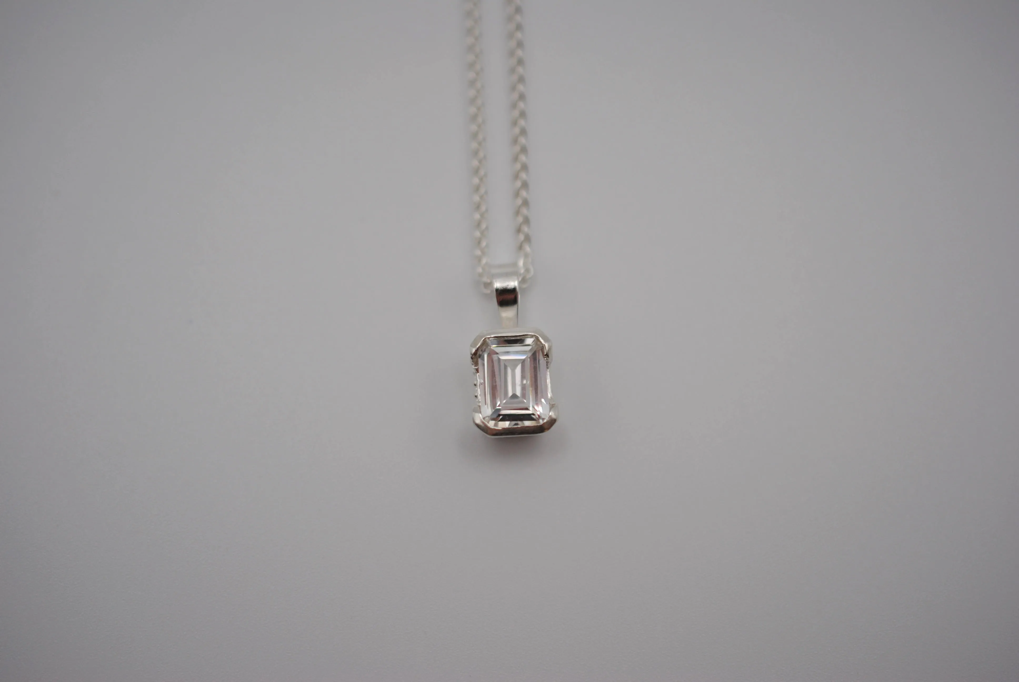Cubic Zirconia Necklace: Emerald Cut, Silver Half Bezel, Adjustable Wheat Chain