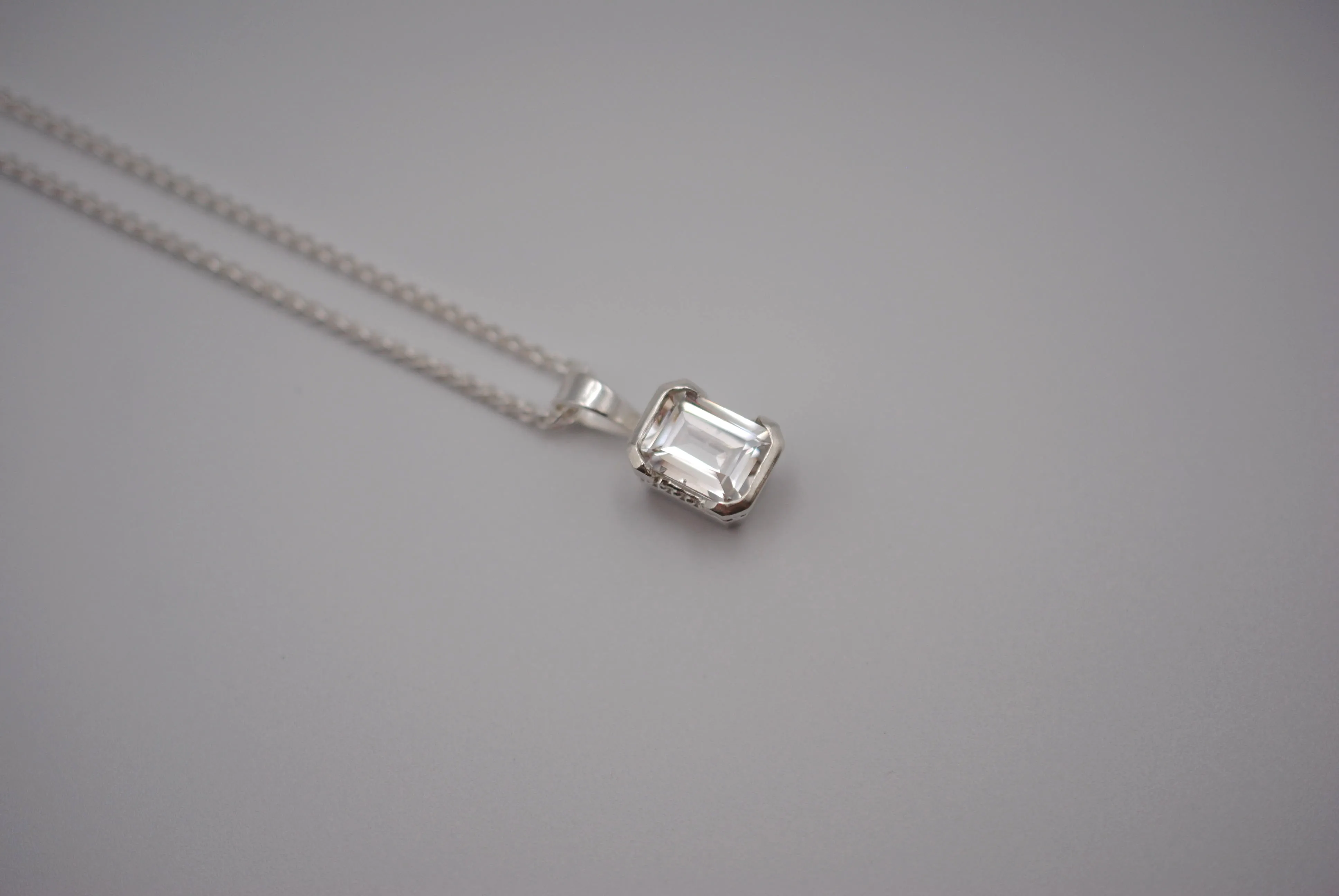 Cubic Zirconia Necklace: Emerald Cut, Silver Half Bezel, Adjustable Wheat Chain
